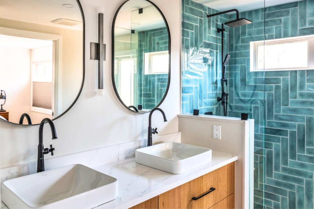 Custom bathroom renovation with tile and dual sink vanity complete with warranty.