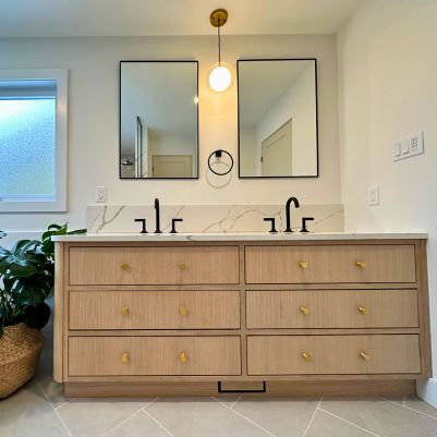 Natural wood vanity in new Ottawa bathroom renovation project.