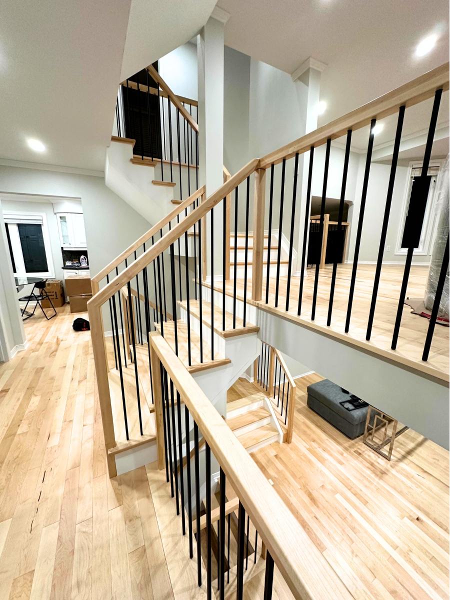 Renovated hardwood stairs, floors and banister in Nepean home.