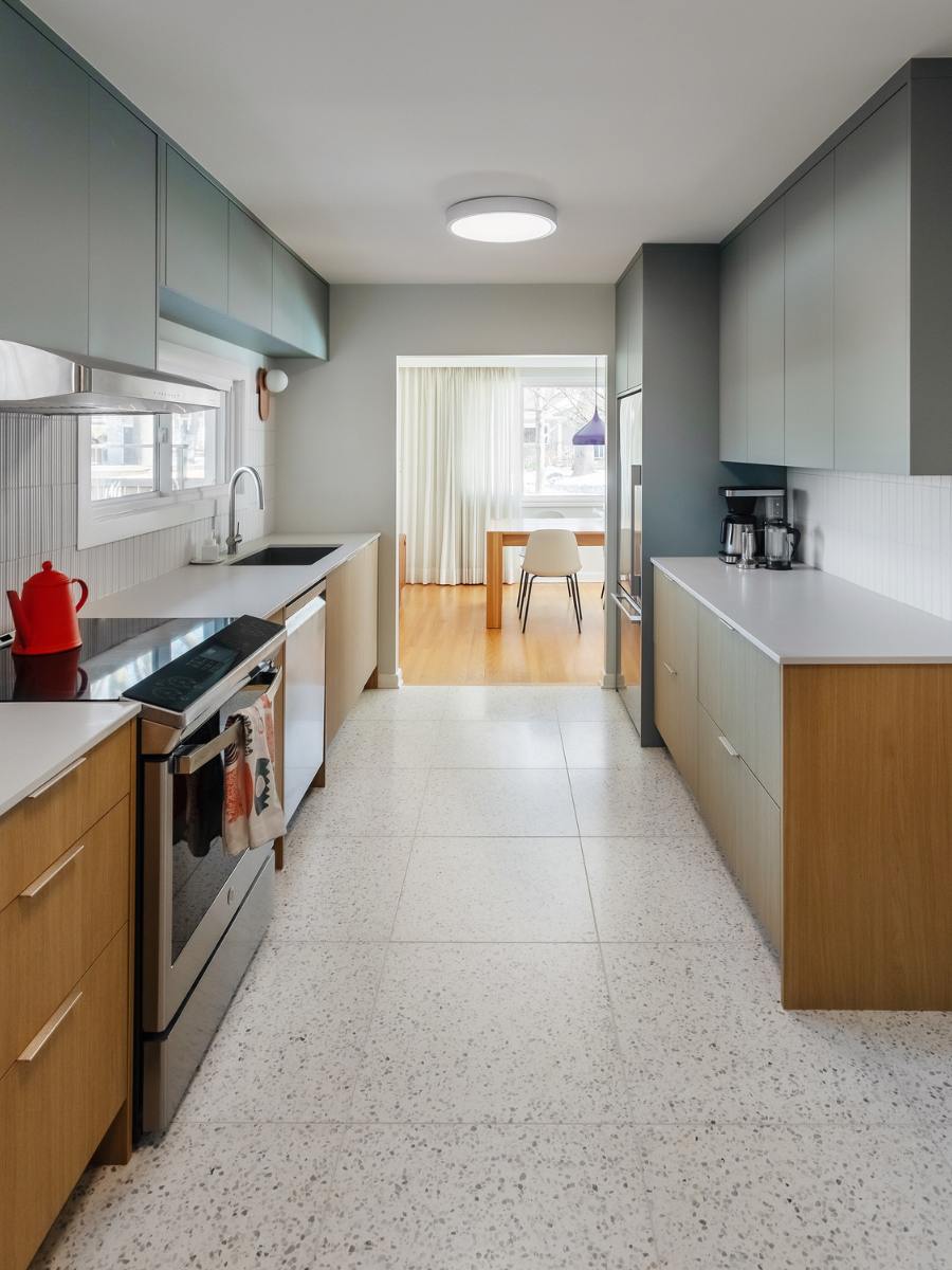 Portrait long shot of newly renovated kitchen in central Ottawa.