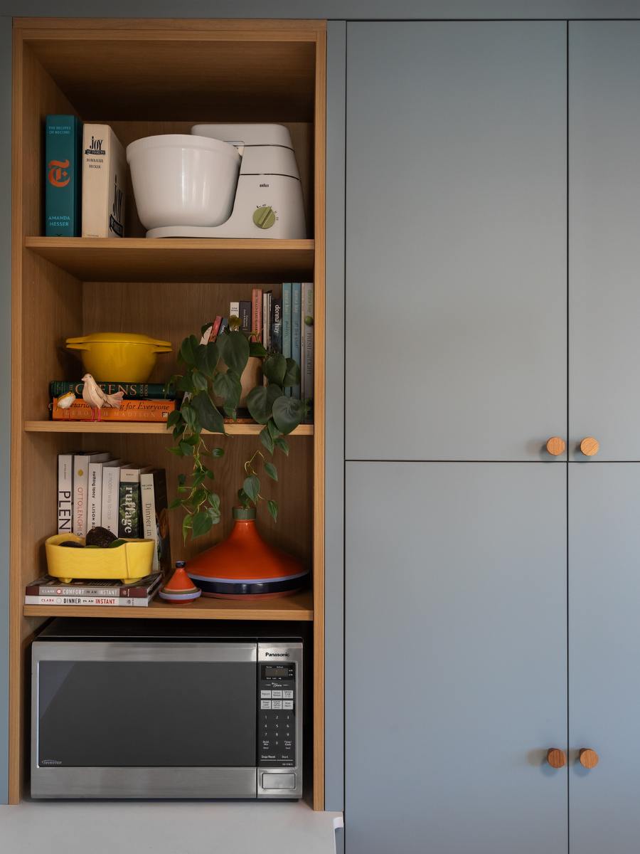 Close up of built-in shelving in renovated kitchen.