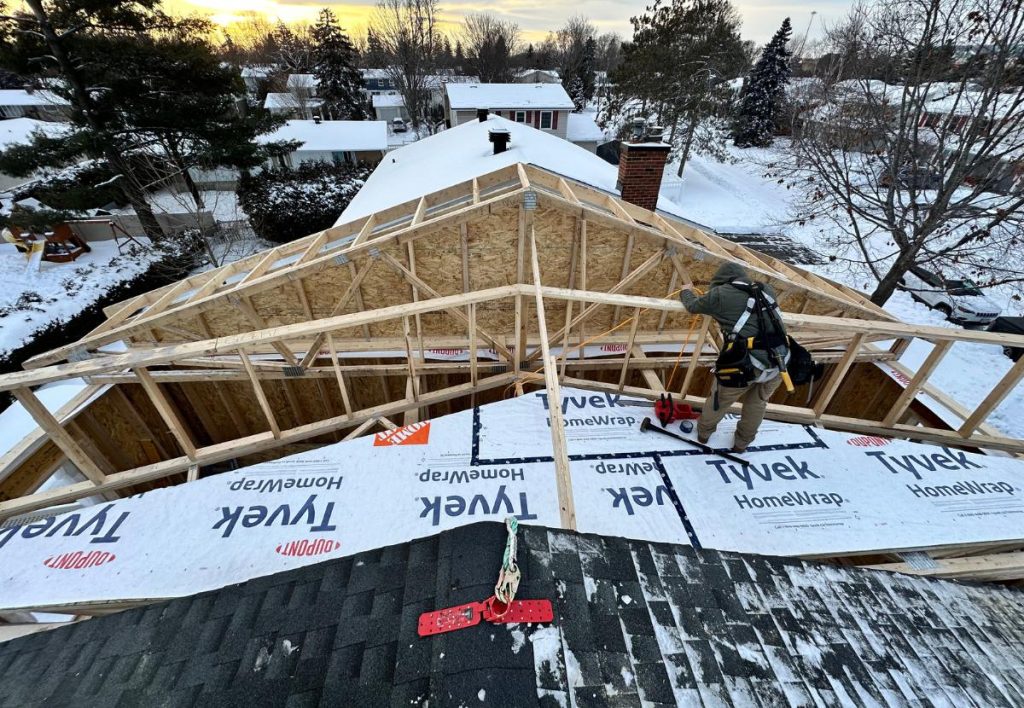 Second story home addition in progress during Ottawa winter.